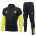 Chaqueta Deportiva Real Madrid 2025/26 - Negro/Amarillo
